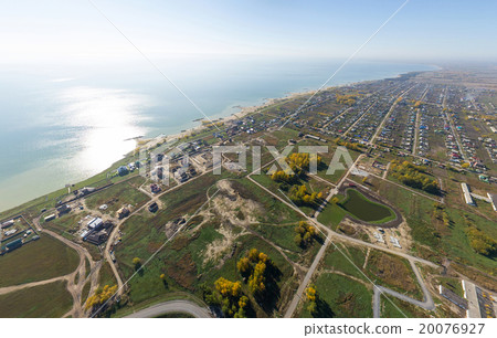 Aerial view of a summer house village at blue sea 20076927