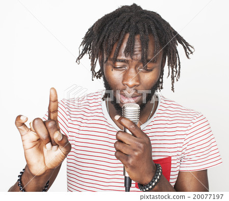 young handsome african american boy singing 20077197