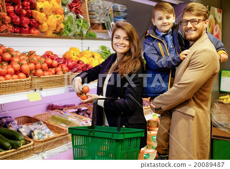 Young family in a grocery store Young family in a grocery store 20089487