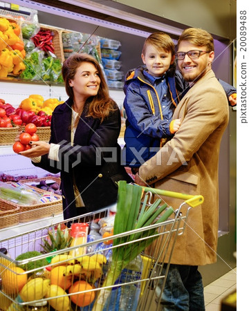 Young family in a grocery store Young family in a grocery store 20089488
