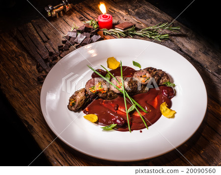 Roasted meat with vegetables and chocolate sauce Roasted meat with vegetables and chocolate sauce 20090560