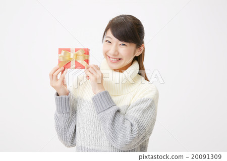 A woman with a gift smile 20091309