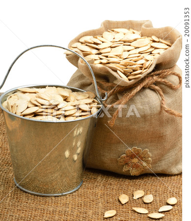 Pumpkin seeds in bag and in bucket Pumpkin seeds in bag and in bucket 20091353