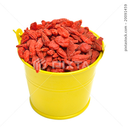 Goji berries in yellow bucket isolated on white Goji berries in yellow bucket isolated on white 20091459
