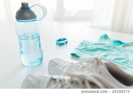 close up of sportswear, bracelet and bottle 20108573