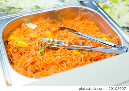 close up of spicy korean carrot salad in container 20108607