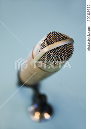 close up of microphone at recording studio 20108612