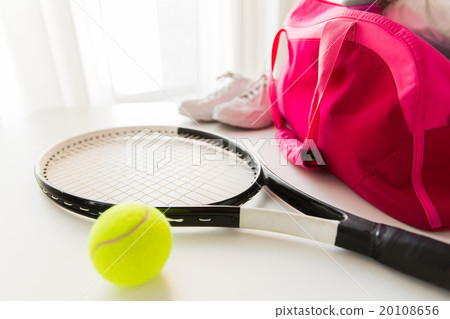 close up of tennis stuff and female sports bag 20108656
