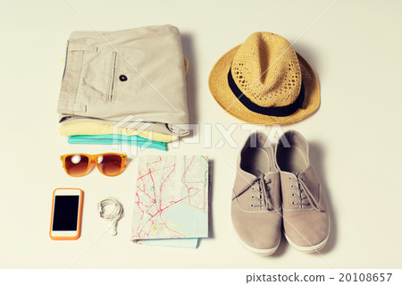 close up of summer clothes and travel map on table 20108657