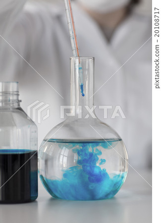 close up of scientist making test in lab 20108717