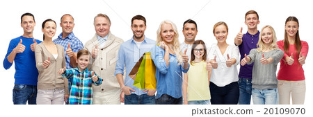 happy people with shopping bags showing thumbs up happy people with shopping bags showing thumbs up 20109070