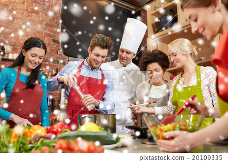 happy friends and chef cook cooking in kitchen happy friends and chef cook cooking in kitchen 20109335