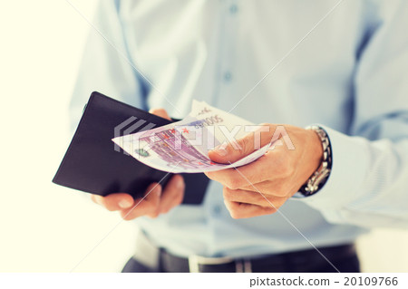 close up of businessman hands holding money close up of businessman hands holding money 20109766