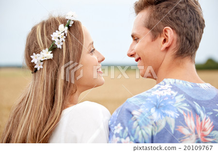 happy smiling young hippie couple outdoors 20109767