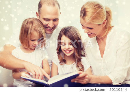 happy family with book at home 20110344