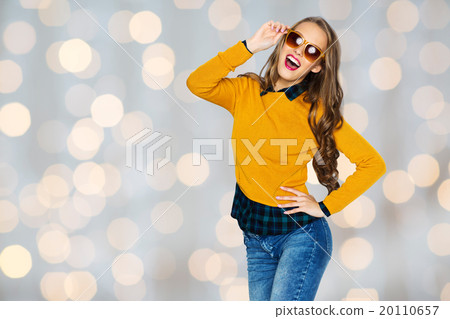 happy young woman or teen girl in casual clothes happy young woman or teen girl in casual clothes 20110657