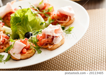 Bruschetta with tomato and ham Bruschetta with tomato and ham 20113485