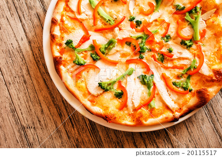pizza on wooden background pizza on wooden background 20115517