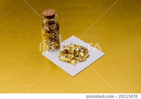 Gold powder and white jacket in white paper Bottle Gold Background 20115870