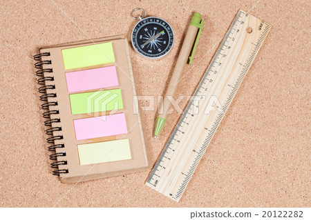 ruler ,pen ,compass and booknote on table 20122282