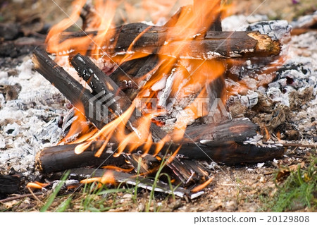 Broken bonfire with flame Broken bonfire with flame 20129808