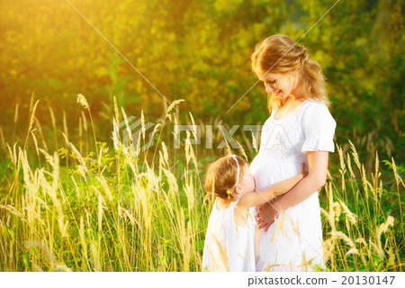happy family, pregnant mother and daughter little child in summ happy family, pregnant mother and daughter little child in summ 20130147