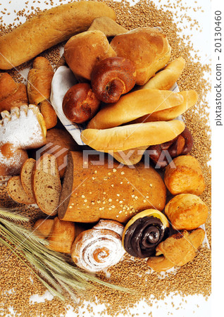 Composition with bread and rolls in wicker basket 20130460