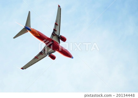 A flying airplane. 20134448