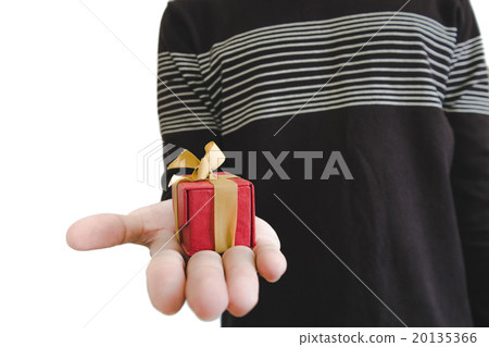 Little gift box on hands, isolated on white Little gift box on hands, isolated on white 20135366