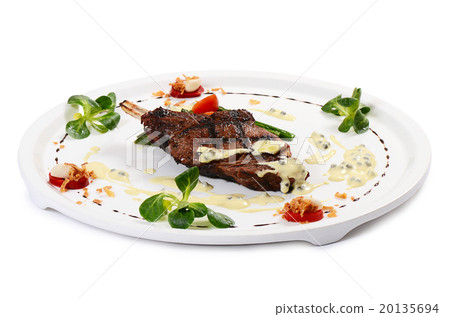 rack of lamb on grill with an asparagus 20135694