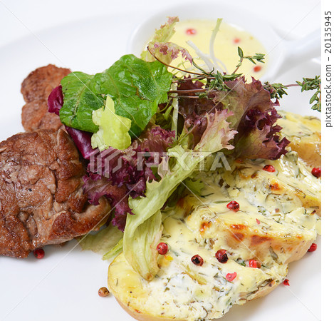 Potatoes with meat in cream sauce with pepper Potatoes with meat in cream sauce with pepper 20135945