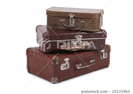 Old suitcase isolated on white background Old suitcase isolated on white background 20135963