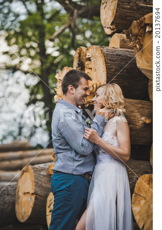 Walk of a newly-married couple about logs 3241. Walk of a newly-married couple about logs 3241. 20137694