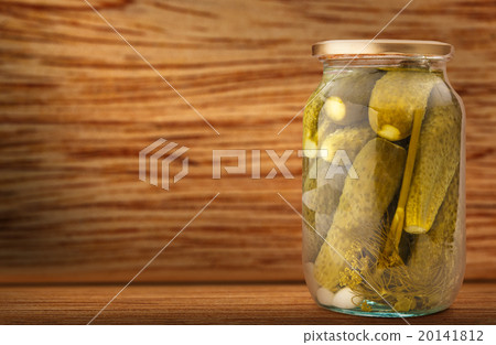 Pickled cucumbers in glass jar 20141812