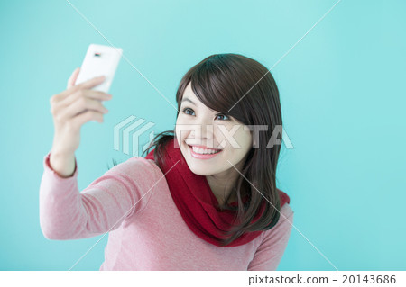 Young woman take a selfie Young woman take a selfie 20143686