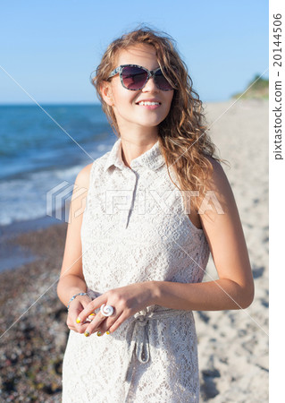 Beautiful girl on a beach Beautiful girl on a beach 20144506