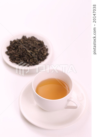 Sweet tea and tea leaves 20147038