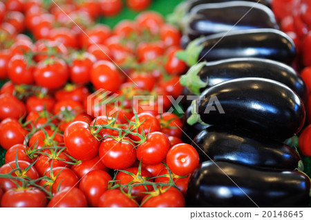 Fresh red Cherry tomatoes and aubergines Fresh red Cherry tomatoes and aubergines 20148645