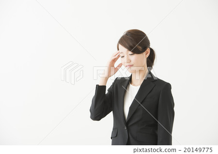 A woman whose head is restrained (Suit in her 20's) A woman whose head is restrained (Suit in her 20's) 20149775