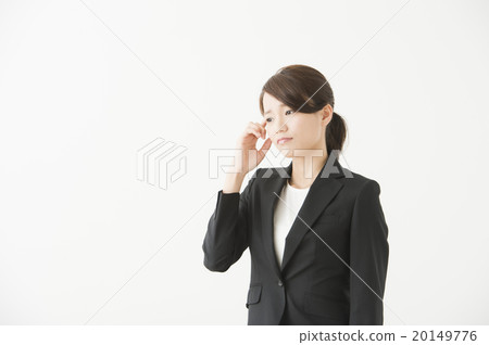 A woman whose head is restrained (Suit in her 20's) A woman whose head is restrained (Suit in her 20's) 20149776