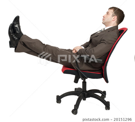 Businessman sitting on chair Businessman sitting on chair 20151296