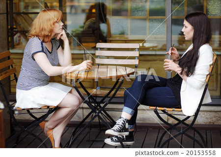 Two woman at the cafe Two woman at the cafe 20153558