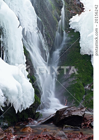 Winter view to cascade of waterfall, icy snow Winter view to cascade of waterfall, icy snow 20156242