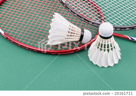 Two new badminton shuttlecock rackets on court Two new badminton shuttlecock rackets on court 20161711