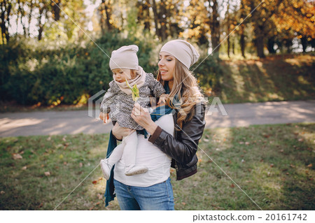 young family walking in the park 20161742