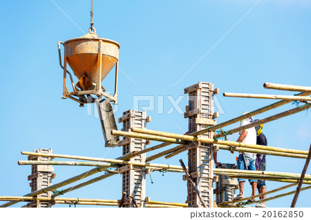 Worker working in construction on blue sky Worker working in construction on blue sky 20162850