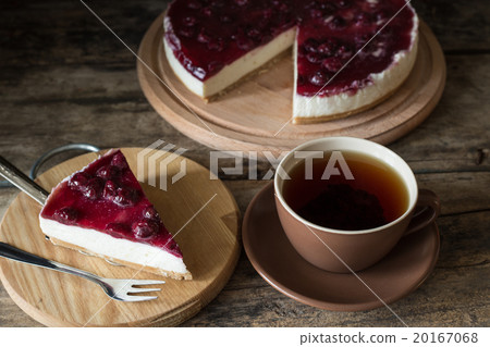 Cup of black tea with slice of cheesecake Cup of black tea with slice of cheesecake 20167068