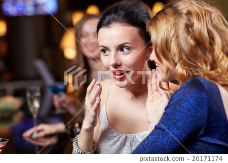 happy women with drinks at night club happy women with drinks at night club 20171174