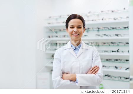 woman optician over glasses at optics store woman optician over glasses at optics store 20171324