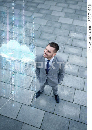 young smiling businessman outdoors from top young smiling businessman outdoors from top 20171606